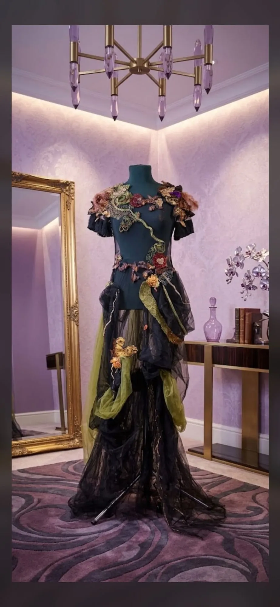 Couture gown on a mannequin in Mihaela's studio
